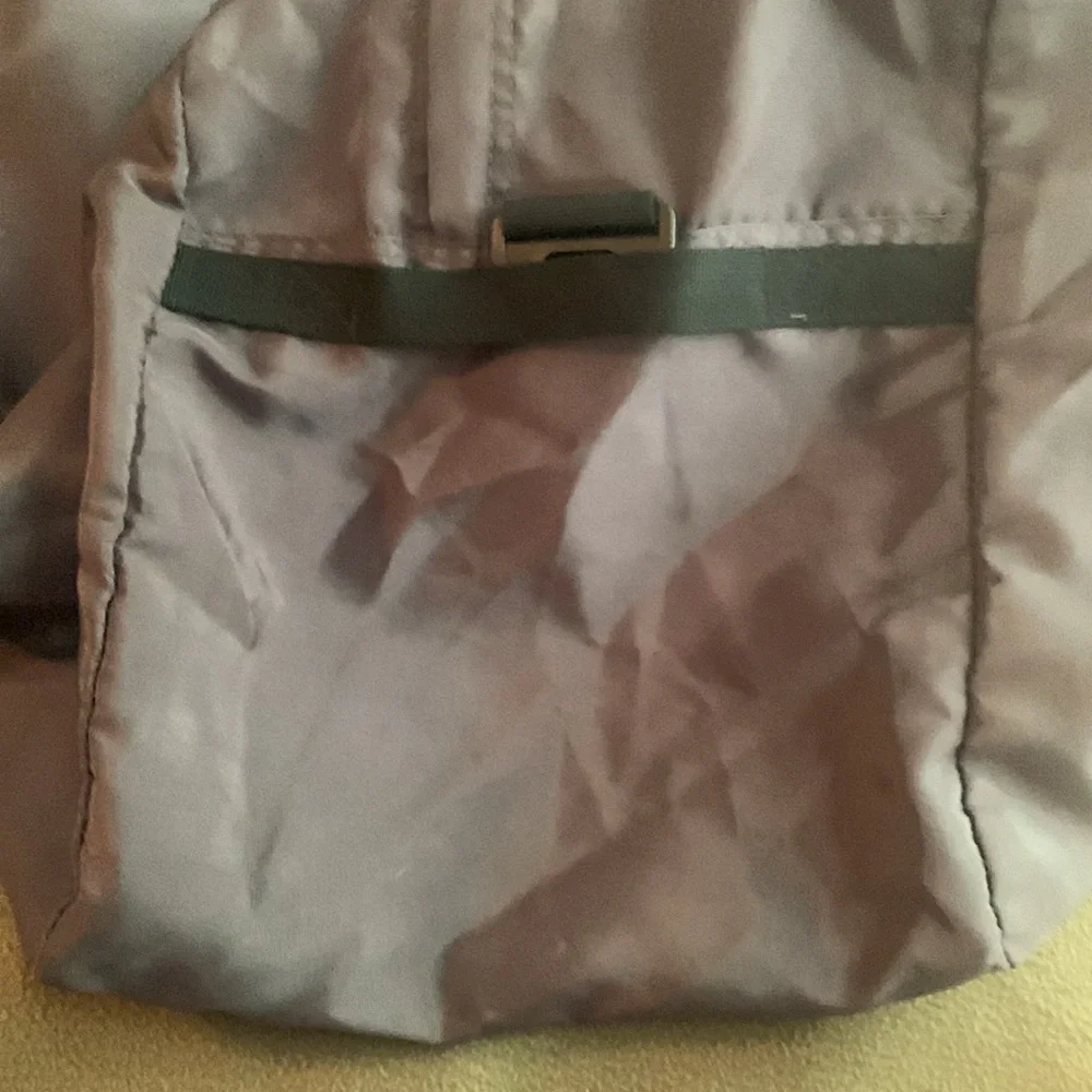 Dark gray and black nylon duffel bag. Approximately 27” x 15” x 11 1/2”